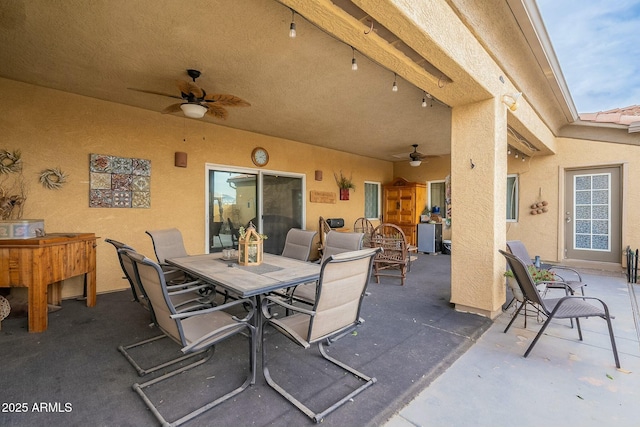 view of patio with ceiling fan