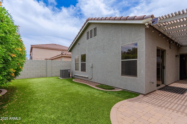 2326 E Spruce Dr, Chandler, AZ 85286 - back of property with stucco siding, central air condition unit, a patio area, a pergola, and a tile roof