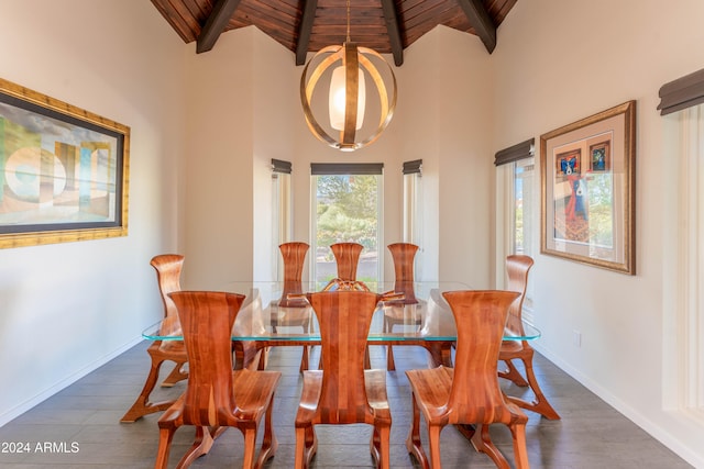 dining room with wood ceiling, a notable chandelier, dark wood-type flooring, and beamed ceiling