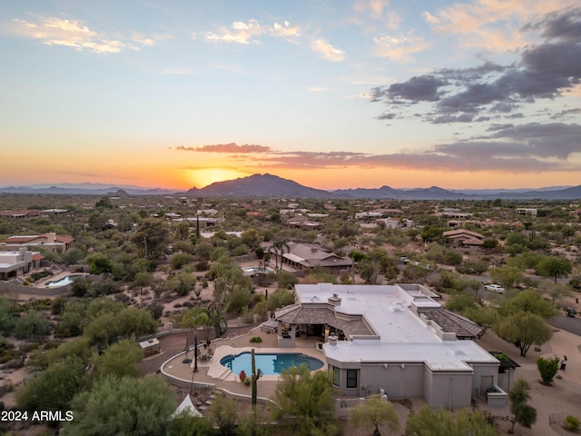 aerial view at dusk with a mountain view