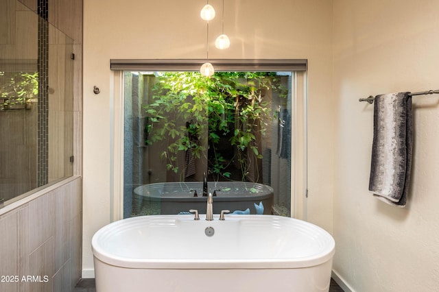 bathroom featuring a bath