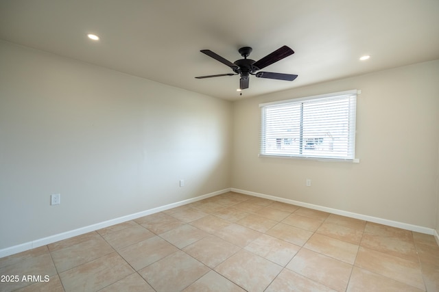 empty room with light tile patterned floors, recessed lighting, baseboards, and a ceiling fan