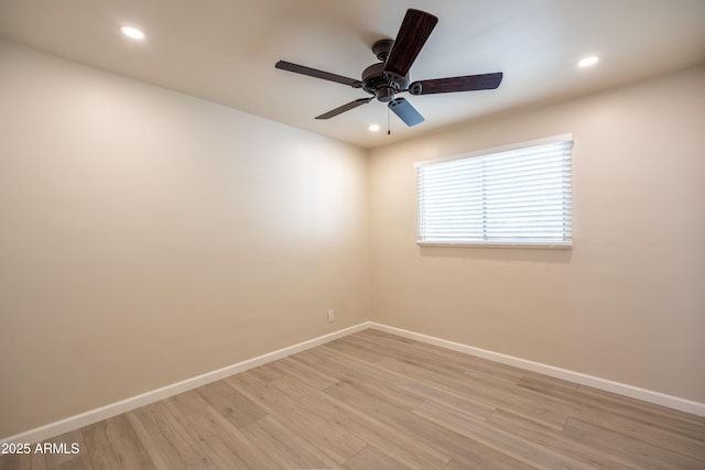 empty room featuring ceiling fan, recessed lighting, baseboards, and light wood-type flooring