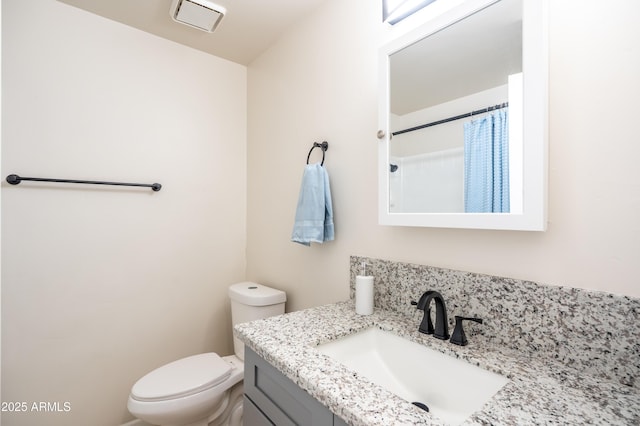 full bath with visible vents, toilet, vanity, and a shower with curtain