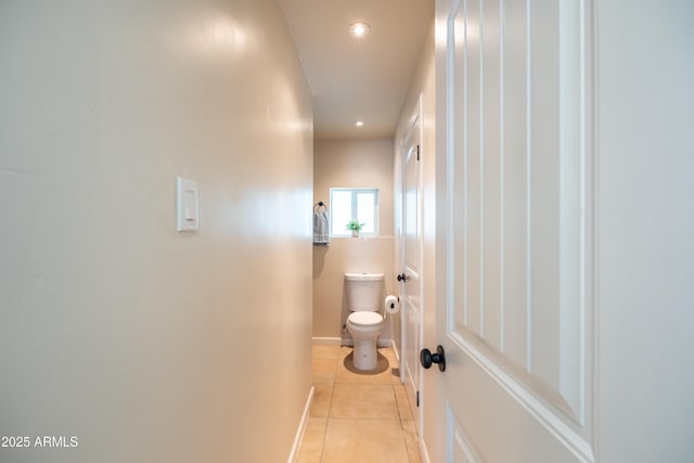 bathroom with tile patterned floors, recessed lighting, toilet, and baseboards