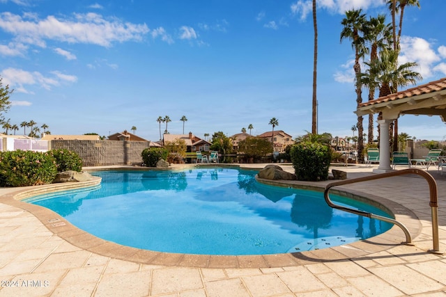 view of swimming pool featuring a patio