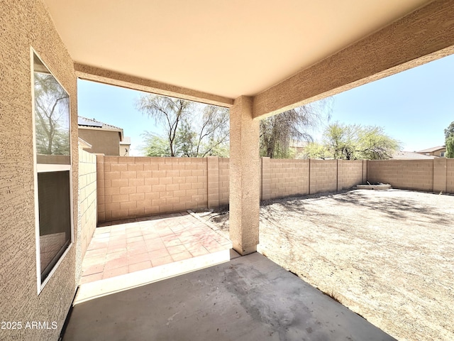 1649 W Wilson Ave, Coolidge, AZ 85128 - fenced backyard with a patio area