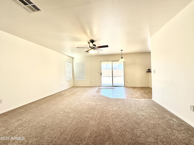 1649 W Wilson Ave, Coolidge, AZ 85128 - unfurnished room featuring carpet floors and a ceiling fan