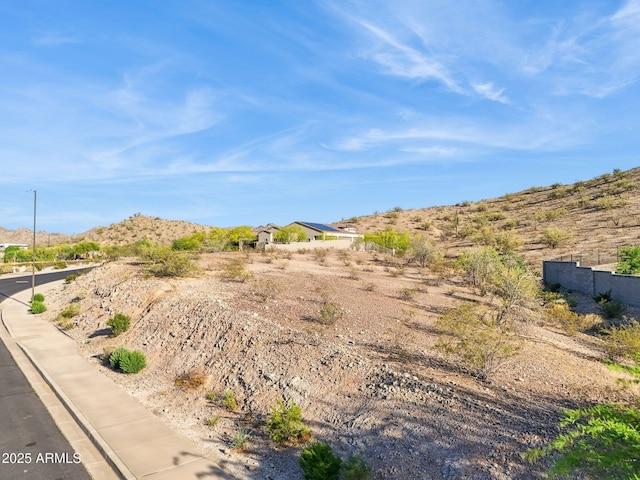 17837 W Estes Way, Goodyear, AZ 85338 - exterior space with a mountain view