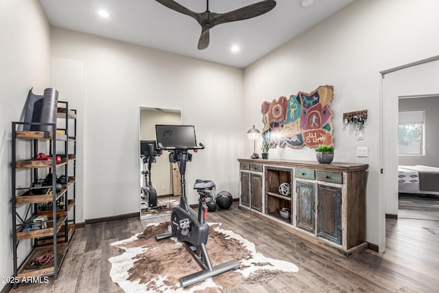 exercise room with ceiling fan, wood finished floors, recessed lighting, and baseboards