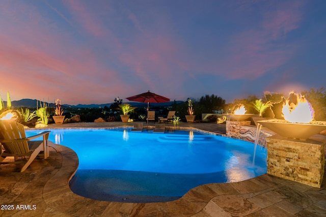 outdoor pool featuring a patio area