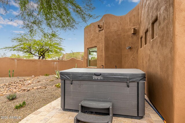 view of patio / terrace with fence