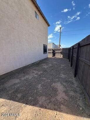 view of home's exterior with a fenced backyard and stucco siding