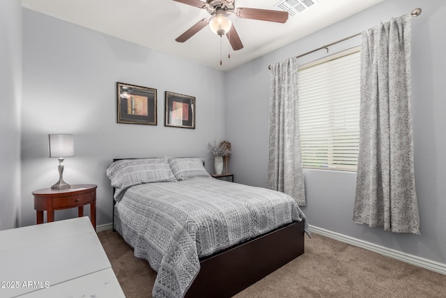 bedroom featuring carpet, baseboards, ceiling fan, and visible vents