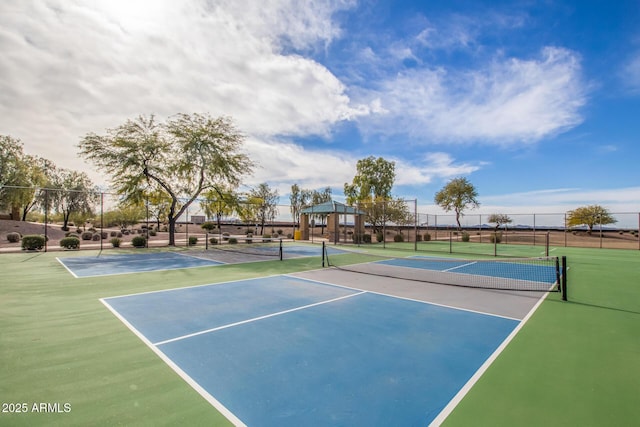 view of sport court featuring community basketball court and fence