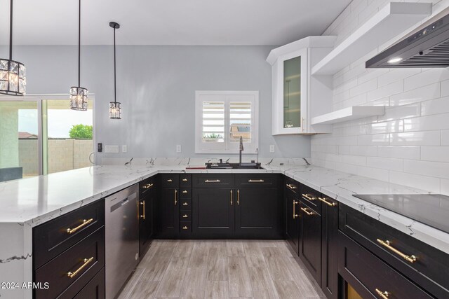 kitchen with decorative light fixtures, stainless steel dishwasher, kitchen peninsula, and white cabinets