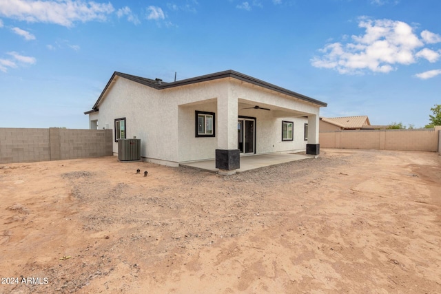 back of house featuring a patio and central air condition unit