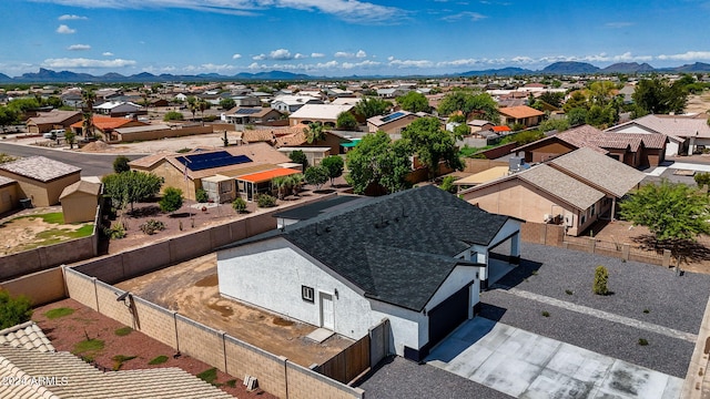 birds eye view of property featuring a mountain view