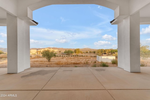 view of patio with a mountain view