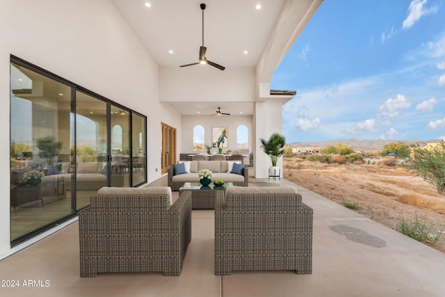 view of patio / terrace featuring ceiling fan and an outdoor hangout area