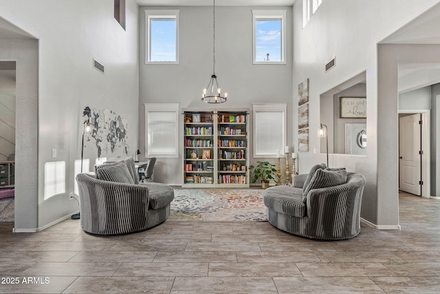 living room featuring a chandelier