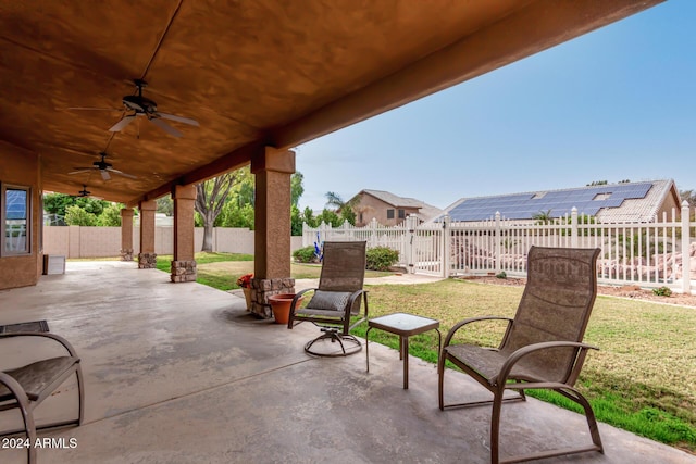 view of patio / terrace featuring ceiling fan