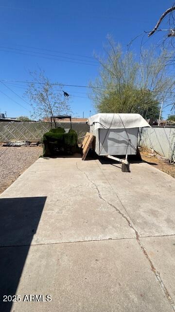3530 W Portland St, Phoenix, AZ 85009 - fenced backyard featuring a patio