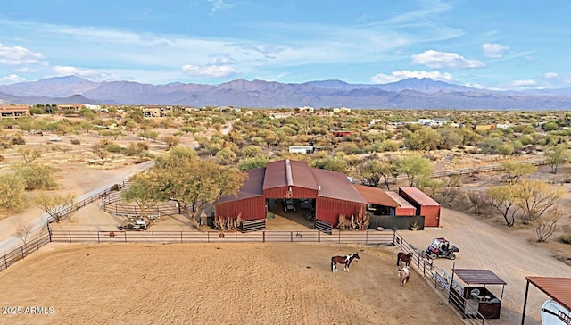 drone / aerial view with a rural view and a mountain view