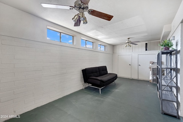 sitting room with finished concrete flooring