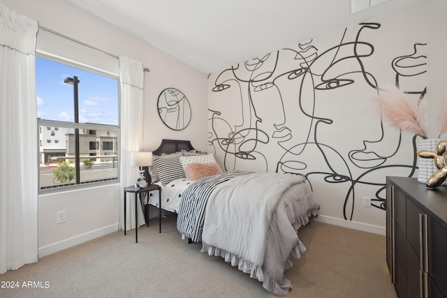 carpeted bedroom with visible vents and baseboards