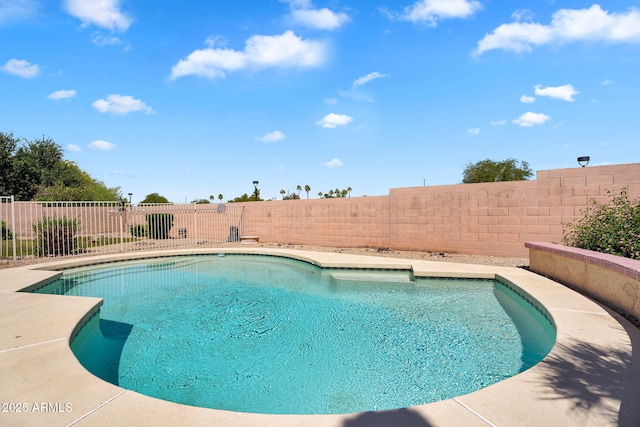 view of pool featuring a fenced backyard