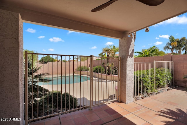 view of swimming pool featuring a fenced backyard and a patio area