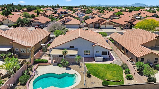 aerial view of residential area with a pool area