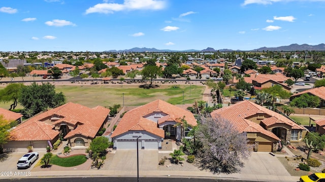 aerial view of residential area with a mountain backdrop