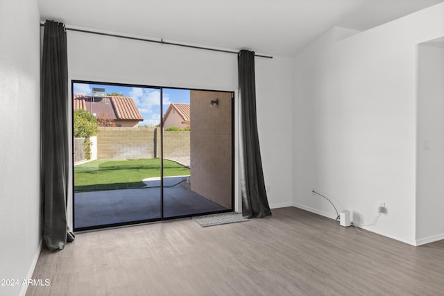 interior space with hardwood / wood-style flooring