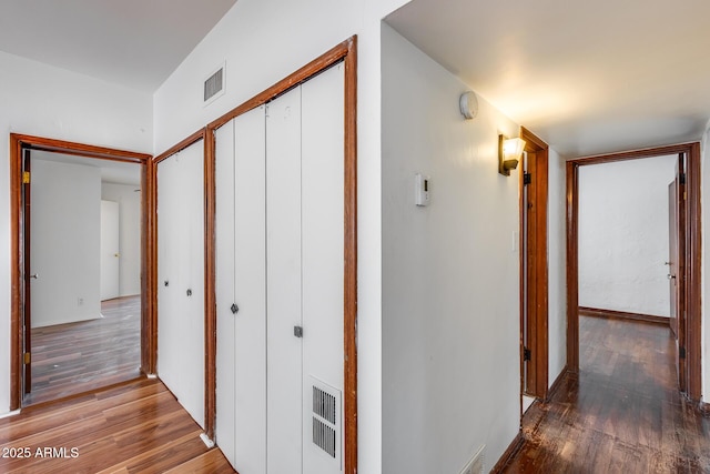 corridor featuring hardwood / wood-style flooring