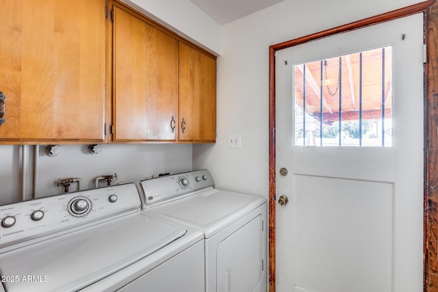 laundry area with cabinets and washer and dryer