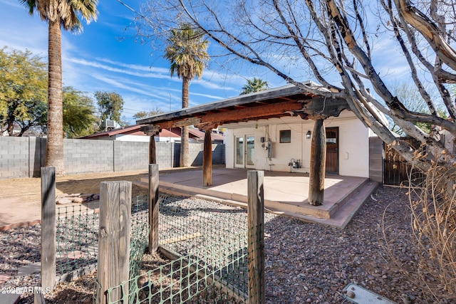 back of house featuring a patio