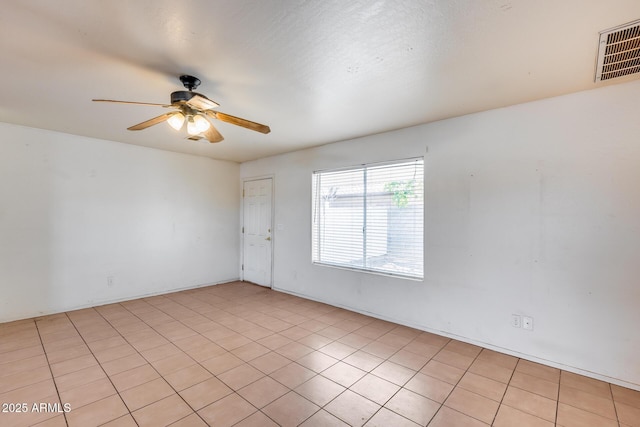 unfurnished room with ceiling fan