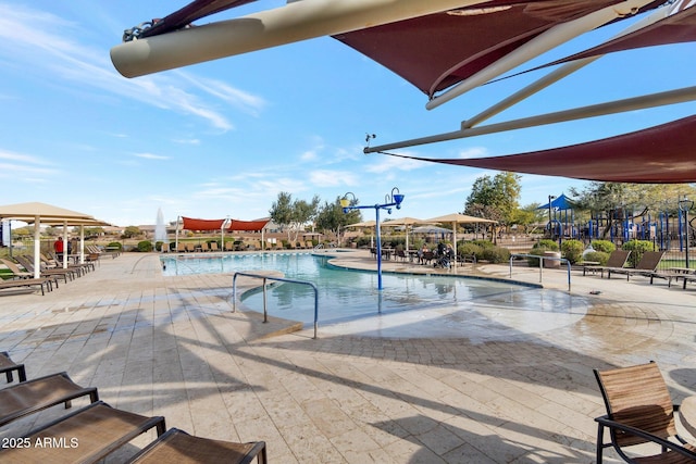 community pool featuring a patio