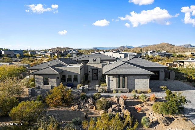 rear view of property featuring a mountain view