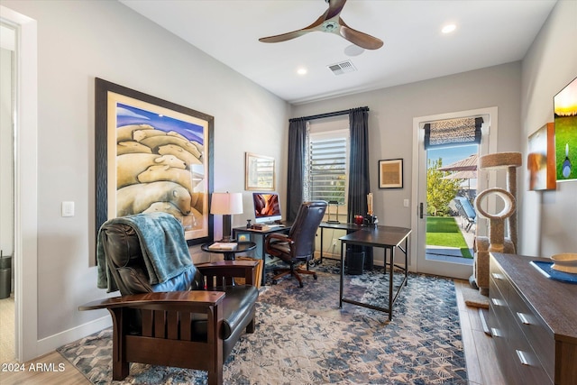 office space featuring hardwood / wood-style floors and ceiling fan