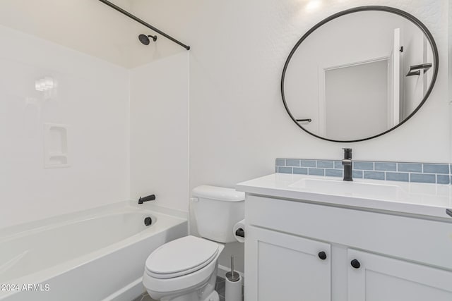 full bathroom with bathing tub / shower combination, vanity, and toilet