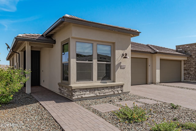 prairie-style home with a garage