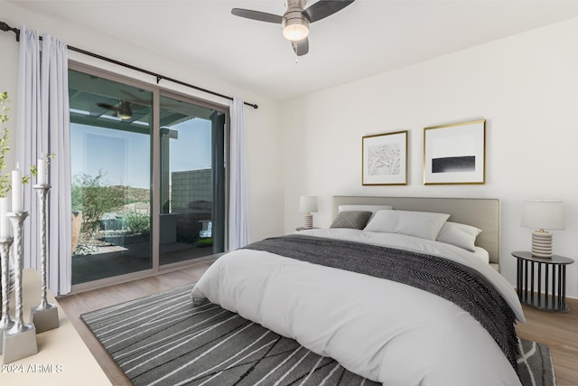 bedroom with access to exterior, hardwood / wood-style floors, and ceiling fan