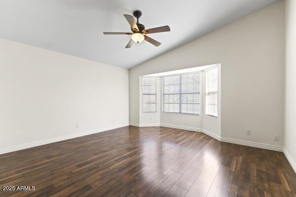 5450 E Paradise Ln, Scottsdale, AZ 85254 - empty room featuring ceiling fan, lofted ceiling, and dark wood-style flooring