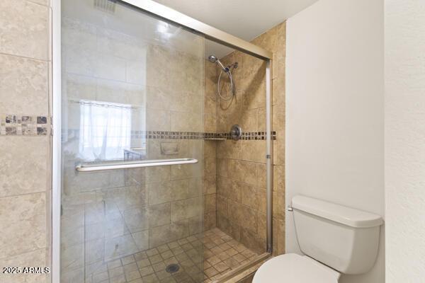 5450 E Paradise Ln, Scottsdale, AZ 85254 - full bathroom with toilet and a stall shower