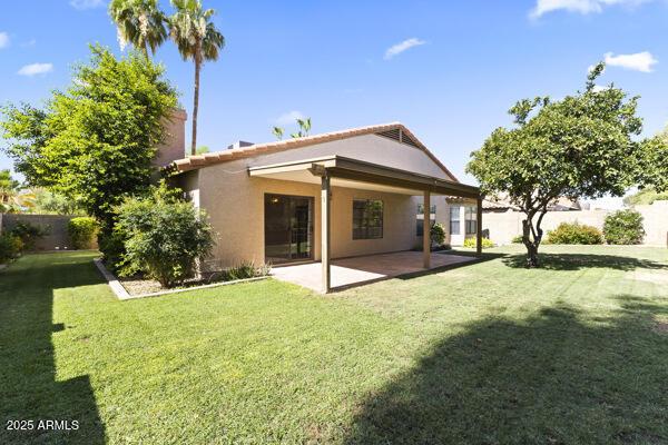 5450 E Paradise Ln, Scottsdale, AZ 85254 - rear view of house featuring a patio area and stucco siding