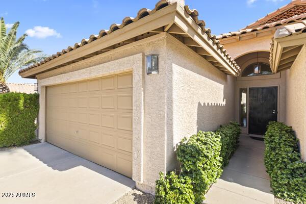 5450 E Paradise Ln, Scottsdale, AZ 85254 - garage featuring concrete driveway