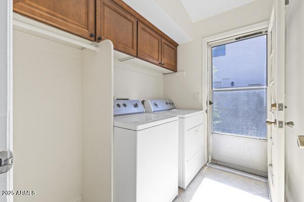 5450 E Paradise Ln, Scottsdale, AZ 85254 - laundry room featuring independent washer and dryer and cabinet space